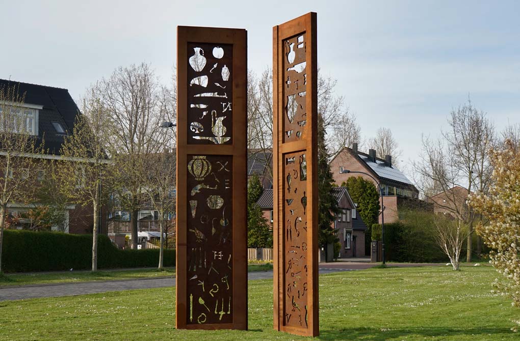 Two corten steel 470 cm high Roman door panels with recesses from archaeological excavations, among other things
