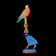 een gekleurd beeld van een egyptische vogel met op zijn kop een olielamp en daarop een duif