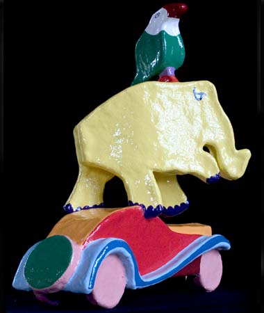For the philosopher H., a Bugatti Profilé, on top of that an elephant and a bird. The sculpture is made of polyester and painted