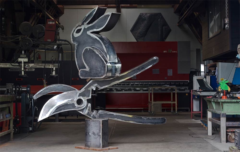 the rabbit has a pair of scissors is ready to be blasted 